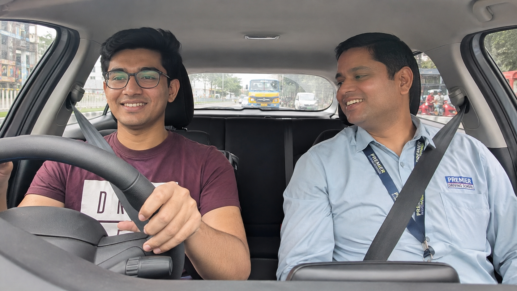 Student learning driving with instructor at Sumukha Driving School Koramangala Bangalore